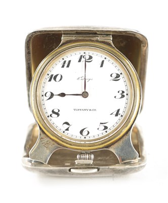 Lot 1101 - AN EARLY 20TH CENTURY SILVER PLATED FOLDING TRAVELLING CLOCK