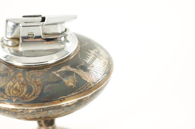 Lot 492 - AN EARLY 20TH CENTURY SIAMESE SILVER NIELLO TABLE LIGHTER