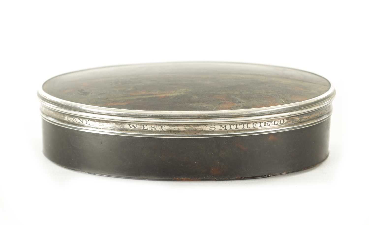 Lot 503 - A GEORGE II SILVER MOUNTED TORTOISESHELL MEMORIAM LIDDED OVAL BOX