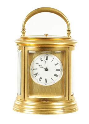 Lot 1200 - DROCOURT, PARIS. A LATE 19TH CENTURY FRENCH GILT BRASS OVAL REPEATING CARRIAGE CLOCK