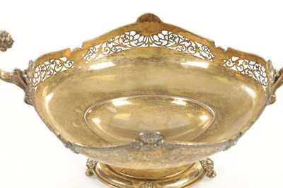 Lot 510 - AN EDWARD VII SILVER GILT TWO-HANDLED BASKET CENTREPIECE