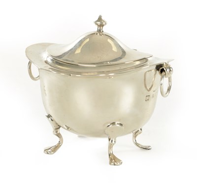 Lot 394 - A SMALL EDWARDIAN SILVER FOOTED OVAL LIDDED TEA CADDY