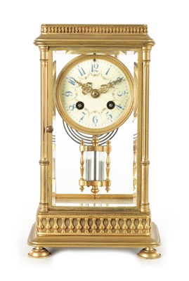 Lot 1090 - A LATE 19TH CENTURY GILT BRASS FOUR GLASS MANTEL CLOCK