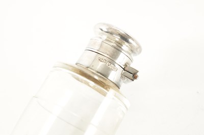 Lot 496 - A LATE VICTORIAN SILVER MOUNTED TRAVELLING SPIRIT FLASK WITH LEATHER OUTERCASE