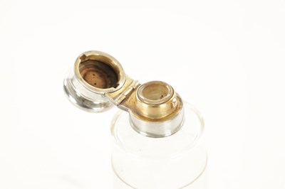 Lot 496 - A LATE VICTORIAN SILVER MOUNTED TRAVELLING SPIRIT FLASK WITH LEATHER OUTERCASE
