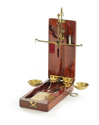 Lot 1252 - A FINE EARLY 19TH CENTURY FOLDING CASED SET OF APOTHECARIES BRASS BALANCE SCALES