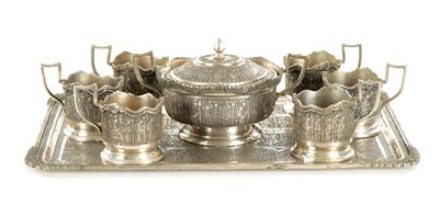 Lot 257 - A LATE 19TH CENTURY SILVER METAL PERSIAN COFFEE SET