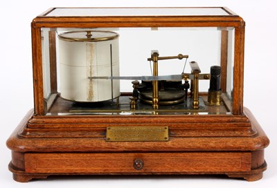 Lot 720 - AN EARLY 20th CENTURY OAK CASED BAROGRAPH by...