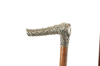 Lot 714 - OF HORSE RACING INTEREST TWO LATE 19TH/EARLY 20TH  CENTURY SILVER-HANDLED WALKING STICKS