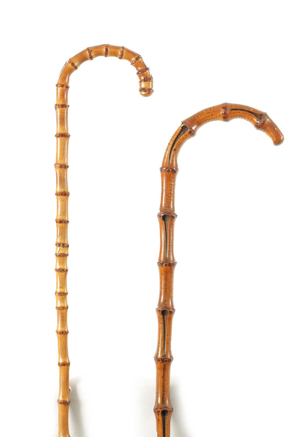 Lot 700 - TWO LATE 19TH CENTURY KNOTCHED WOOD WALKING