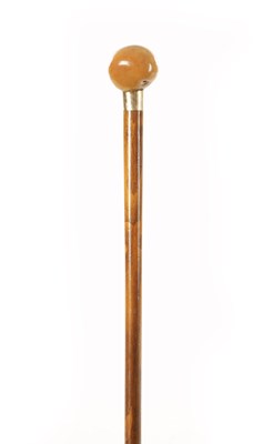 Lot 739 - A GOLD METAL MOUNTED SLENDER WALKING STICK STAMPED 'BRIGG'