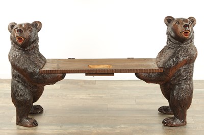 Lot 1300 - A LARGE 19TH CENTURY CARVED LINDEN WOOD BLACK FOREST BEAR BENCH