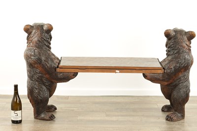 Lot 1300 - A LARGE 19TH CENTURY CARVED LINDEN WOOD BLACK FOREST BEAR BENCH