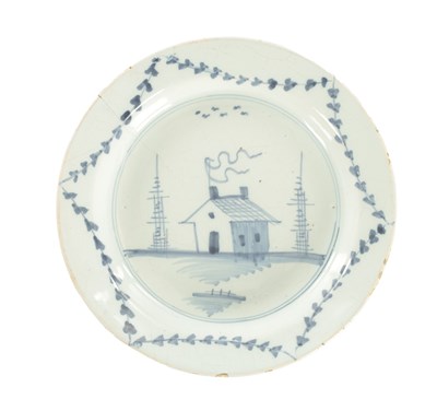 Lot 28 - AN 18TH CENTURY BLUE AND WHITE DELFT SHALLOW DISH