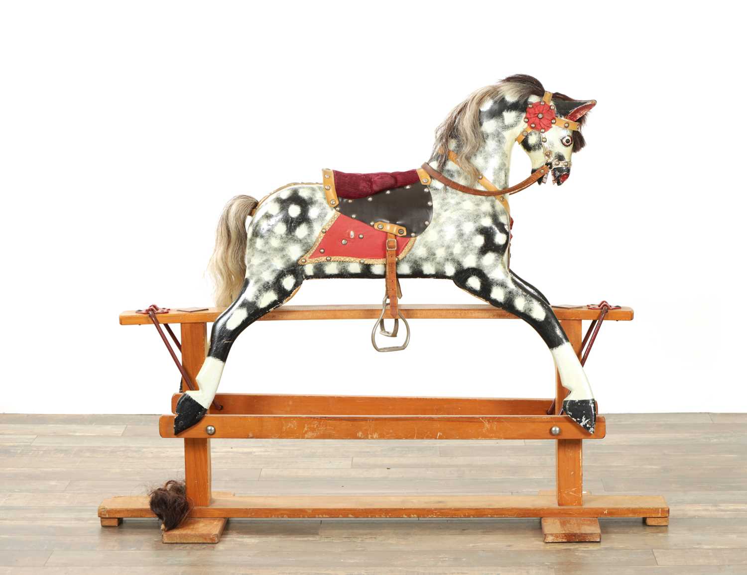 Lot 922 - AN EARLY 20TH CENTURY COLLINSON DAPPLED GREY CARVED WOOD ROCKING HORSE