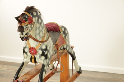 Lot 922 - AN EARLY 20TH CENTURY COLLINSON DAPPLED GREY CARVED WOOD ROCKING HORSE