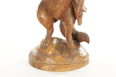 Lot 1348 - A LARGE AND RARE 19TH CENTURY BLACK FOREST CARVED LINDEN WOOD TOBACCO JAR FORMED AS A FOX