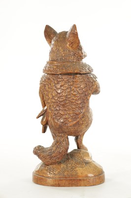 Lot 1348 - A LARGE AND RARE 19TH CENTURY BLACK FOREST CARVED LINDEN WOOD TOBACCO JAR FORMED AS A FOX