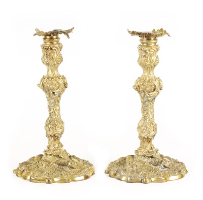 Lot 746 - A PAIR OF 18TH CENTURY FRENCH GILT ORMOLU ROCOCO CANDLESTICKS