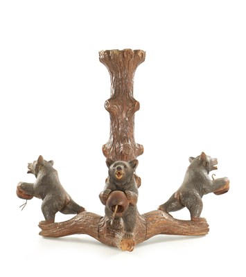 Lot 1310 - A LATE 19TH CENTURY CARVED LINDEN WOOD BLACK FOREST BEAR THREE BRANCH HANGING LIGHT