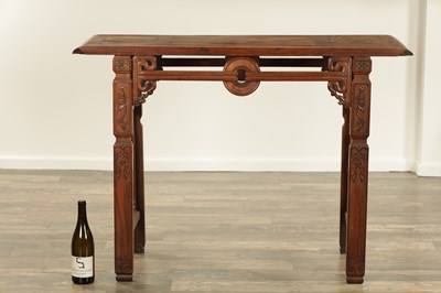 Lot 269 - A 19TH CENTURY CHINESE CARVED HARDWOOD ALTAR TABLE WITH TRIPLE BURR PANELLED TOP