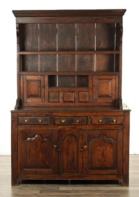 Lot 1488 - AN EARLY 18TH CENTURY AND LATER WELSH OAK CANOPY DRESSER