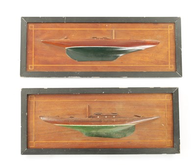 Lot 917 - A PAIR OF 19TH CENTURY CARVED WOOD HALF HULL MODELS