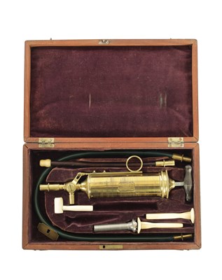 Lot 1265 - AN 19TH CENTURY CASED ENEMA SET