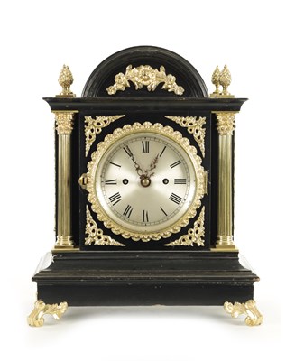 Lot 1167 - A LATE 19TH CENTURY EBONISED AND ORMOLU MOUNTED MANTEL CLOCK