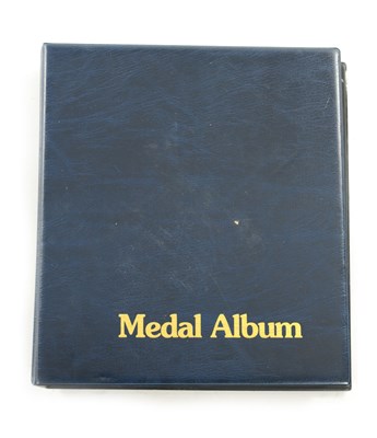 Lot 615 - AN ALBUM OF ASSORTED MULTINATIONAL MILITARY MEDALS