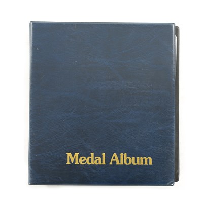 Lot 616 - AN ALBUM OF ASSORTED CONTINENTAL MILITARY SERVICE MEDALS