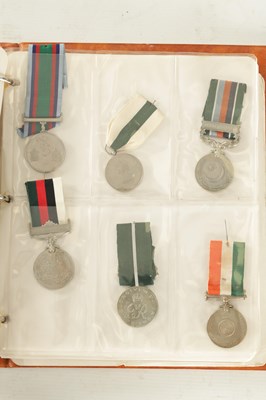 Lot 617 - AN ALBUM OF ASSORTED MULTINATIONAL MILITARY MEDALS