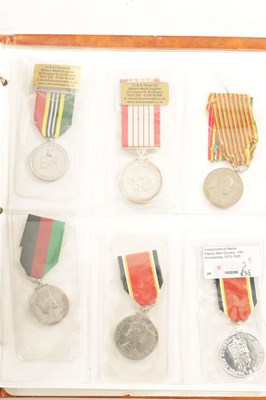 Lot 617 - AN ALBUM OF ASSORTED MULTINATIONAL MILITARY MEDALS