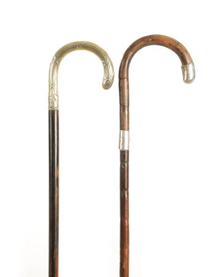 Lot 689 - AN ENGRAVED SILVER MOUNTED WALKING STICK