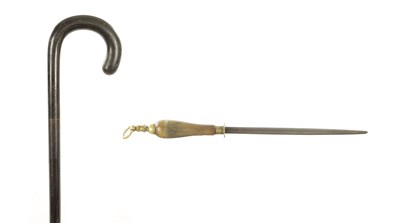 Lot 685 - A 19TH CENTURY HORN WALKING STICK AND HORN HANDLED SHARPENER