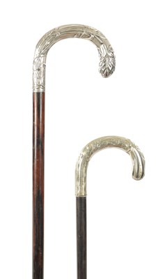 Lot 716 - TWO LATE 19TH CENUTRY SILVER TOPPPED ART NOUVEAU WALKING STICKS