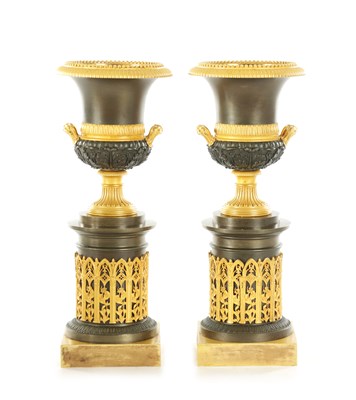 Lot 896 - A PAIR OF REGENCY BRONZE AND GILT BRONZE URNS