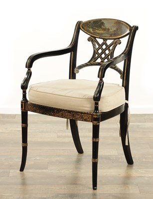 Lot 1409 - A REGENCY STYLE LACQUERED PAINTED BERGERE ARMCHAIR