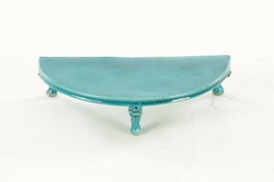 Lot 187 - A CHINESE QING DYNASTY TURQUOISE GLAZED TABLE STAND