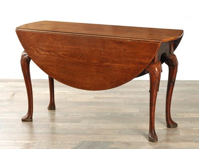 Lot 1447 - A GOOD EARLY GEORGE III FIGURED WALNUT GATE-LEG TABLE