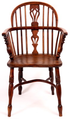 Lot 671 - An early/mid 19th Century Yew wood low back...