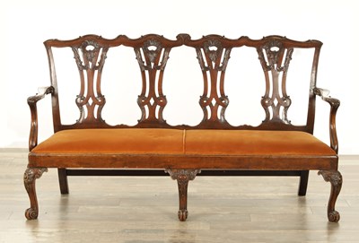 Lot 1398 - A 19TH CENTURY CHIPPENDALE CARVED MAHOGANY SETTEE