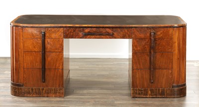 Lot 1411 - A STYLISH ART DECO WALNUT AND COROMANDEL PEDESTAL DESK