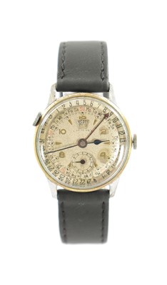 Lot 584 - A 1960'S GENTLEMAN’S TRIPLE CALENDAR WRISTWATCH