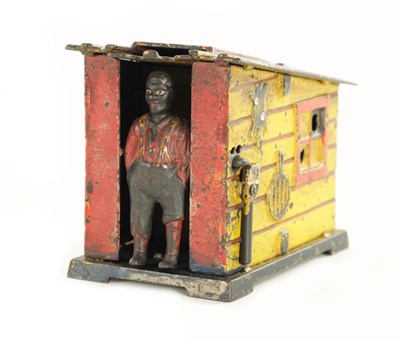 Lot 793 - A LATE 19TH CENTURY J. E. STEVENS 1885 CAST IRON PAINTED “CABIN” MONEY BOX