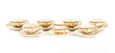 Lot 245 - A LATE 19TH CENTURY JAPANESE SET OF SATSUMA PORCELAIN CUPS AND SAUCERS