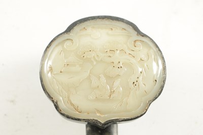 Lot 182 - A 19TH CENTURY CHINESE CARVED JADE AND SAGE JADE RUYI SCEPTER