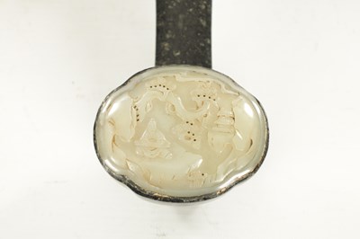 Lot 182 - A 19TH CENTURY CHINESE CARVED JADE AND SAGE JADE RUYI SCEPTER