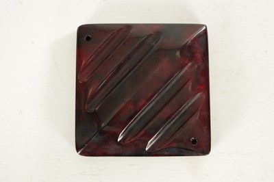 Lot 928 - AN ART DECO CHERRY AMBER 'STARDUST' BAKELITE PEN TRAY