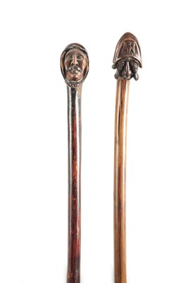 Lot 734 - TWO 19TH CENTURY FOLK ART CARVED FRUITWOOD WALKING STICKS